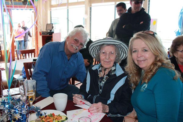 Owners Denise and Alan with favorite customer Diana in the middle.